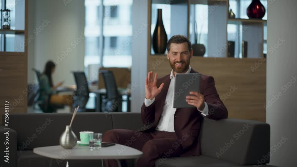 Business man waving hand modern tablet computer conference at big window cabinet Business man waving hand modern tablet computer conference at big window cabinet