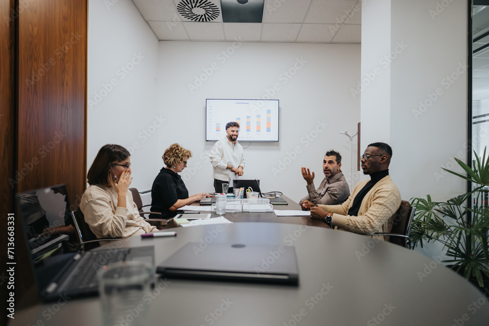 Diverse partners in a modern office strategize for business growth, analyzing statistics and sharing ideas towards success. Diverse partners in a modern office strategize for business growth, analyzing statistics and sharing ideas towards success.