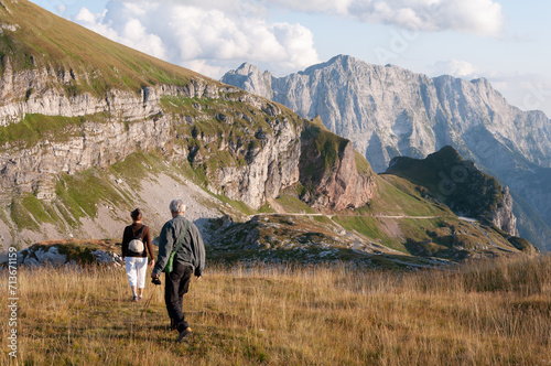 Senior Married Couple Hiking on Mangart Saddle - Julian Alps, Slovenia