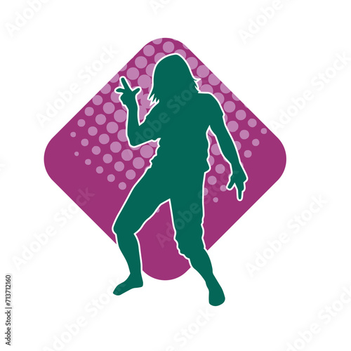 Silhouette of a male dancer in performing pose. Silhouette of a dancing man.