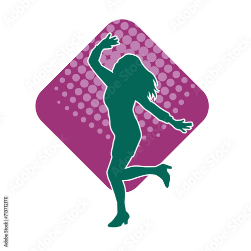 Silhouette of a female dancer in action pose. Silhouette of a woman dancing happily.