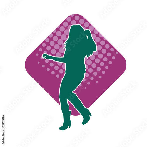 Silhouette of a female dancer in action pose. Silhouette of a woman dancing happily.