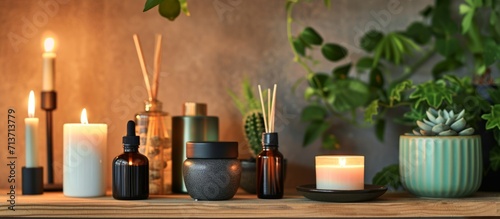 Home Spa Setting with Candles and Aromatherapy on Wooden Shelf