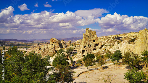 Goreme open air museum is a vast complex of monastic settlements and rock-cut churches in Goreme,a UNESCO world heritage site in the Cappadocia Region, Central Anatolia,Turkey. photo