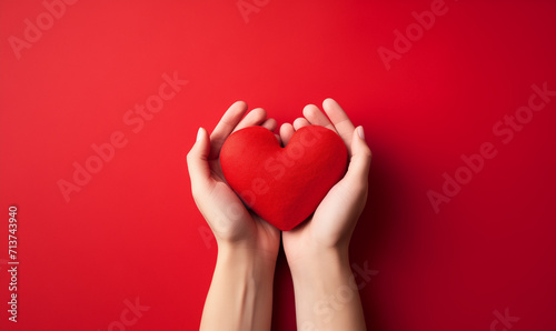 Helping hand of heart donor for patient in heart  Red heart, Family hands holding red heart, health care, hope, life insurance concept, world heart day, Generative AI photo