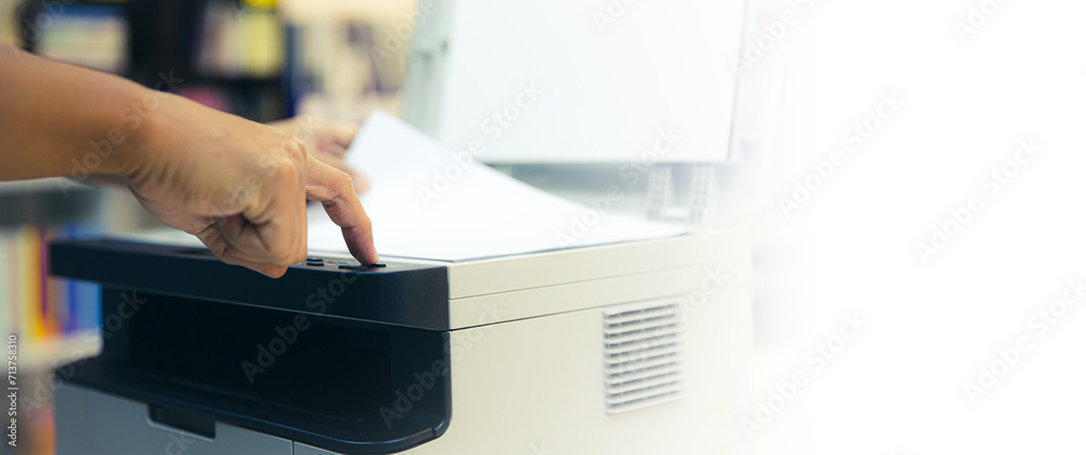 Hand use copier or photocopier or photocopy machine office equipment workplace for scanner or scanning document or printer for printing paperwork hard copy duplicate Xerox service maintenance repair. - obrazy, fototapety, plakaty 