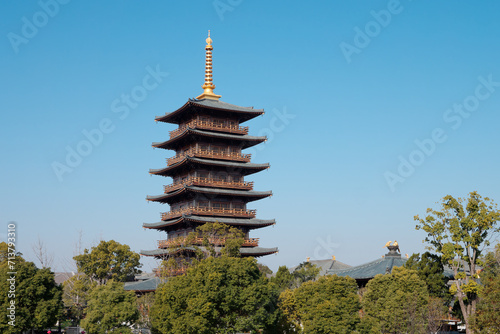 Ancient Tang dynasty style pagoda in Baoshan temple. Buddhist temple located on the banks of the Lianqi River, Baoshan, Shanghai.