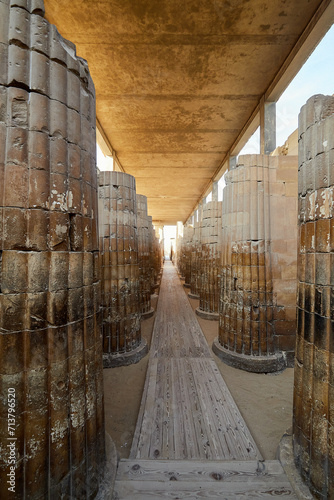 Papyrus Stalk columns line the monumental causeway in the entrance of the step pyramid of Djoser, Saqqara, Egypt photo