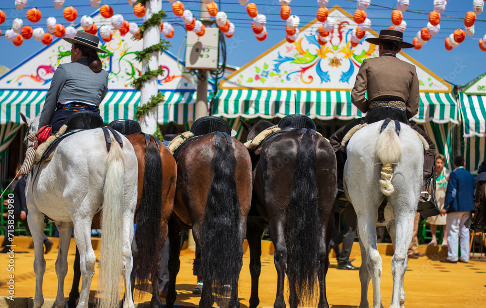 Fototapeta premium beautiful horses with their riders at the Feria de Abril in Seville,Andalusia,Spain