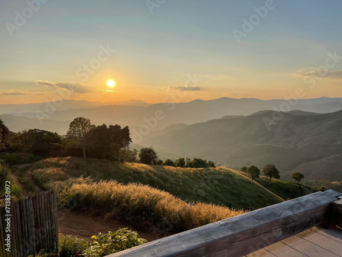 Beautiful sunset at Doi Chang North of Thailand photo