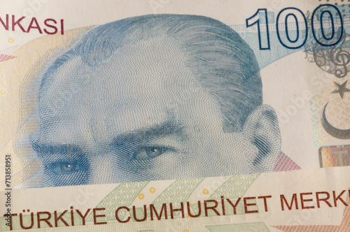 Turkish money, closeup of hundreds of Turkish lira banknotes on light background. money background or concept surface photo with lira banknotes currency of Turkey or Turkiye. finance concept photo