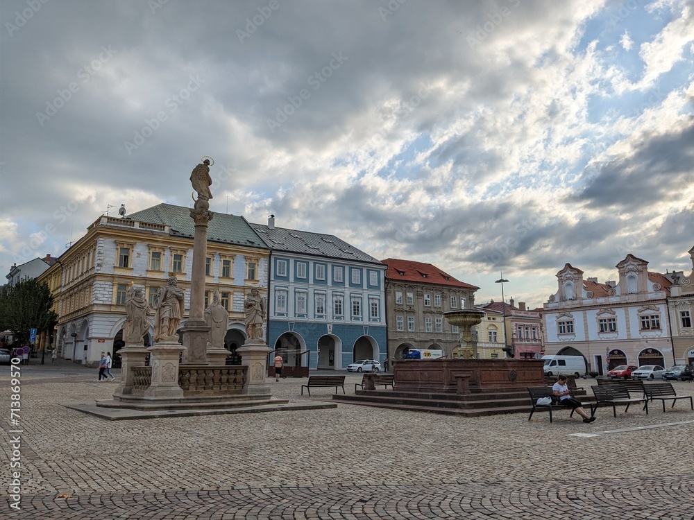 Kolin,Czech republic-July 16 2023:Kolin town square with fountain and column, historical city center and cathedral,old town square