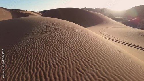 The Sahara desert dry valleys, mountains, salt flats, barren and rocky plateaus, and sand dunes.  desert spanning North Africa, the largest hot desert in the world and the third-largest desert overall photo