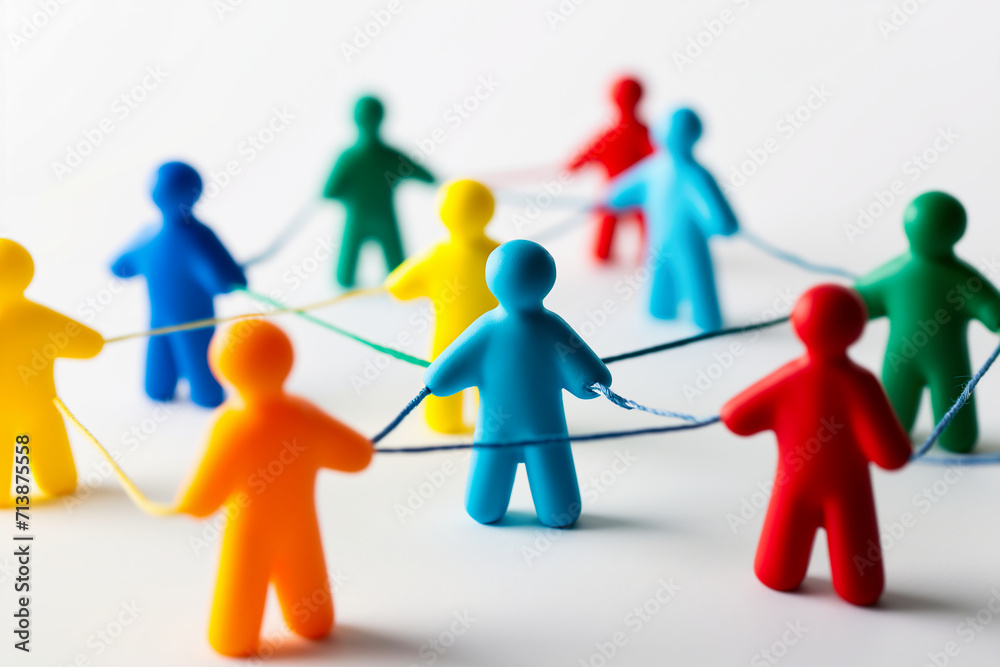 Teamwork concept. People connected by rope on white background
Teamwork concept. People connected by rope on white background