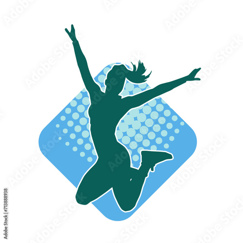 Silhouette of a happy slim woman jumping cheerfully.