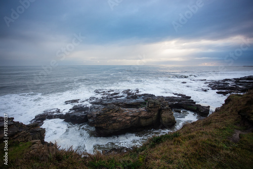 waves crashing against rocks