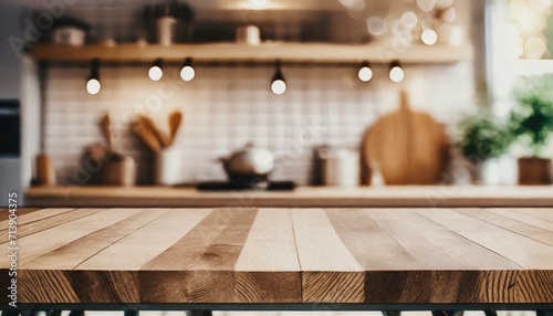 Empty beautiful wood table top counter and blur bokeh modern kitchen interior background  photo