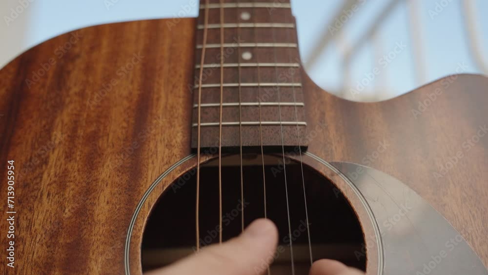 Fast Shutter Speed Camera Captures Wave Motions of Strings During Guitar Playing, Close-Up. Fast Shutter Speed Camera Captures Wave Motions of Strings During Guitar Playing, Close-Up.