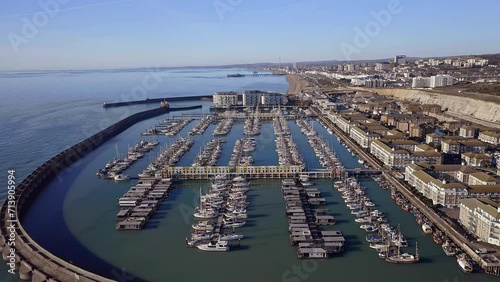 Brighton Marina in East Sussex, Southern England, with Brighton beach in view, a popular holiday destination, aerial video.
