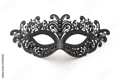 White background with isolated black carnival mask and ornament.