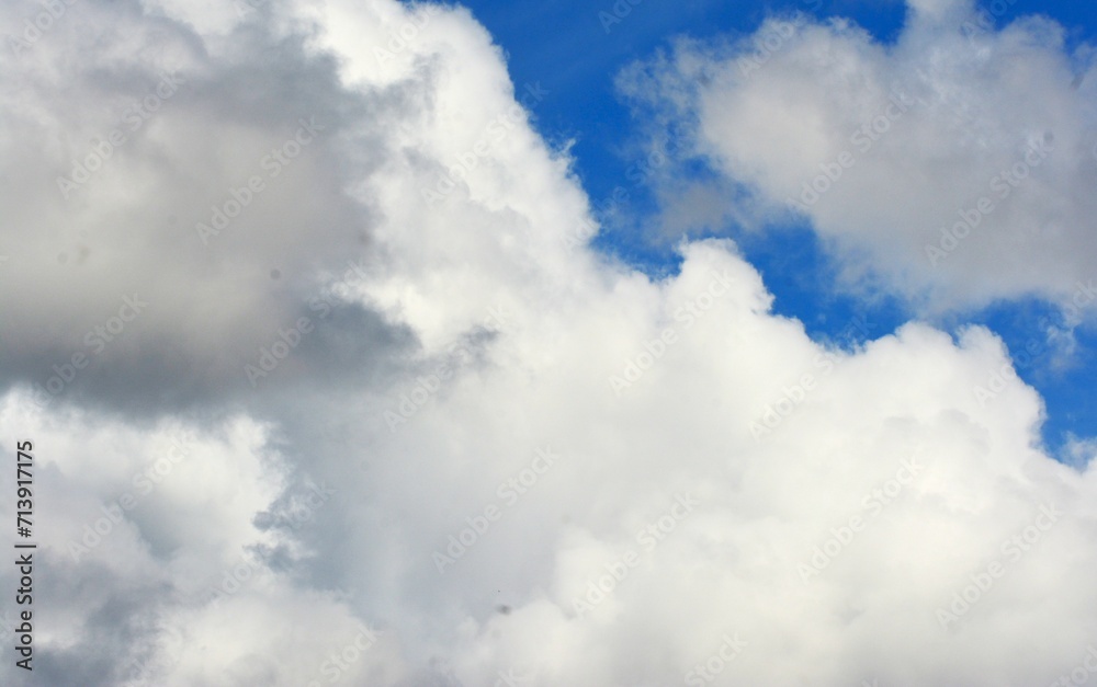 photo of white sky and bright blue clouds