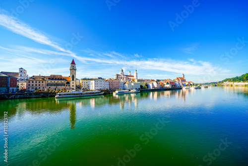 View of some buildings and the surrounding landscape by the river in the city of Passau.  © Elly Miller