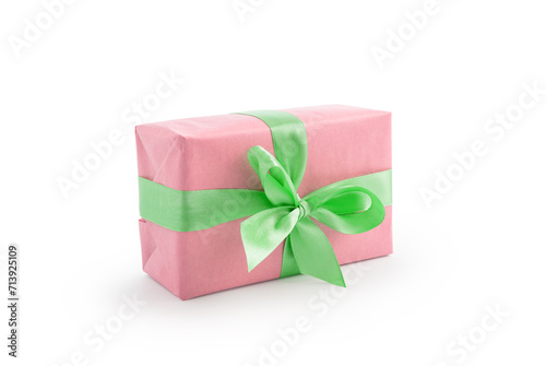 Pink paper present box with green ribbon bow isolated on white background © GCapture
