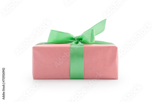 Pink paper present box with green ribbon bow isolated on white background
