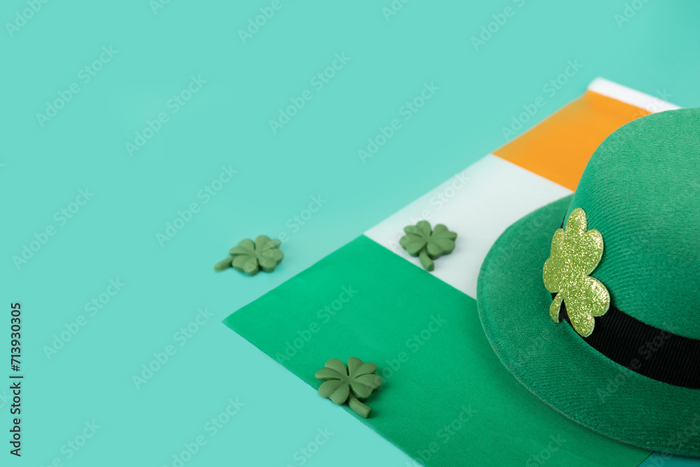 green irish leprechaun hat with shamrocks and irish flag on green background green irish leprechaun hat with shamrocks and irish flag on green background