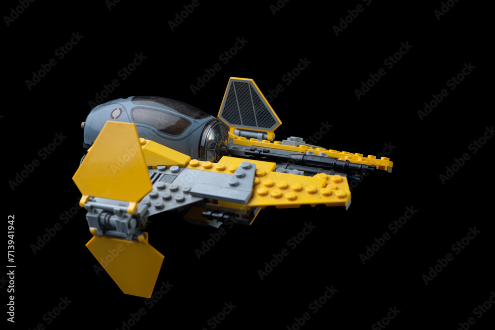 Fototapeta premium Depok, Indonesia - January 16, 2024: Lego toys photography, lego anakin skywalker's jedi starfighter on solid black background