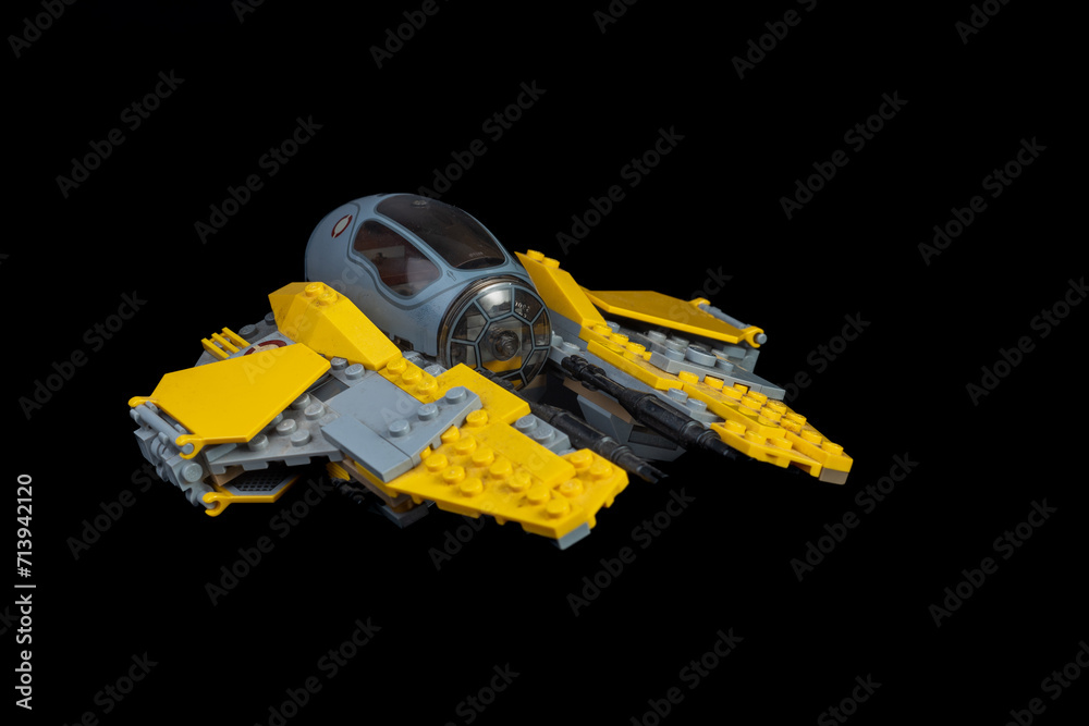 Obraz premium Depok, Indonesia - January 16, 2024: Lego toys photography, lego anakin skywalker's jedi starfighter on solid black background