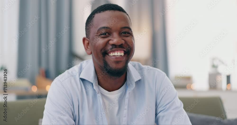 Happy African man, face and sofa in home living room with pride, confidence and relax on vacation. Person, guy and smile on lounge couch, house or apartment for portrait for style, fashion or clothes Happy African man, face and sofa in home living room with pride, confidence and relax on vacation. Person, guy and smile on lounge couch, house or apartment for portrait for style, fashion or clothes