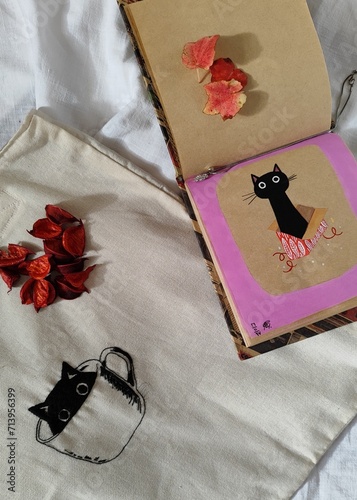 book with rose and tote bag