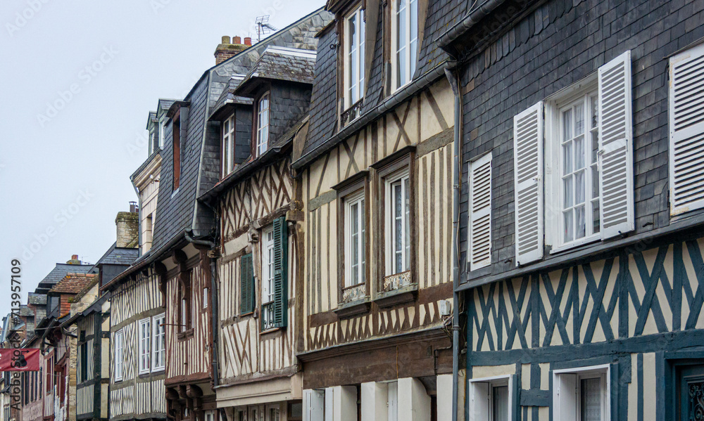 View of ancient building facades in the town of Honfleur, Normandy, France