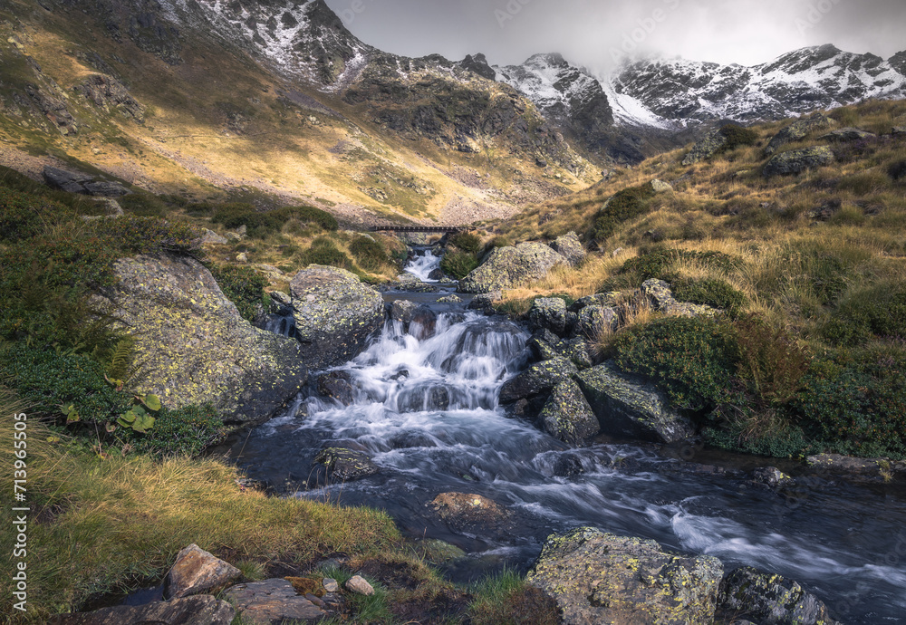 Waterfall at Tristaina Lakes in the Pyrenees, Andorra Waterfall at Tristaina Lakes in the Pyrenees, Andorra