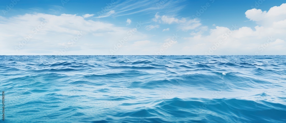 Obraz premium Vast Blue Ocean With Clouds in the Sky