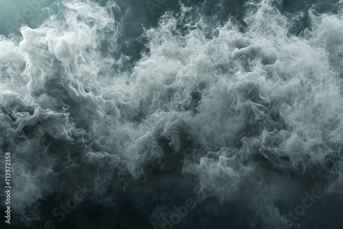 cloud of gray smoke against a dark background