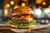 Gourmet cheeseburger on a wooden board against blurred restaurant interior background