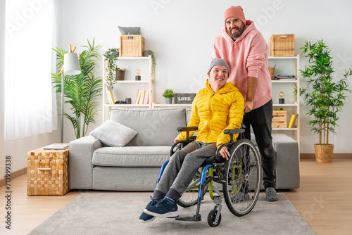 Portrait of a caregiver and a disabled man at home