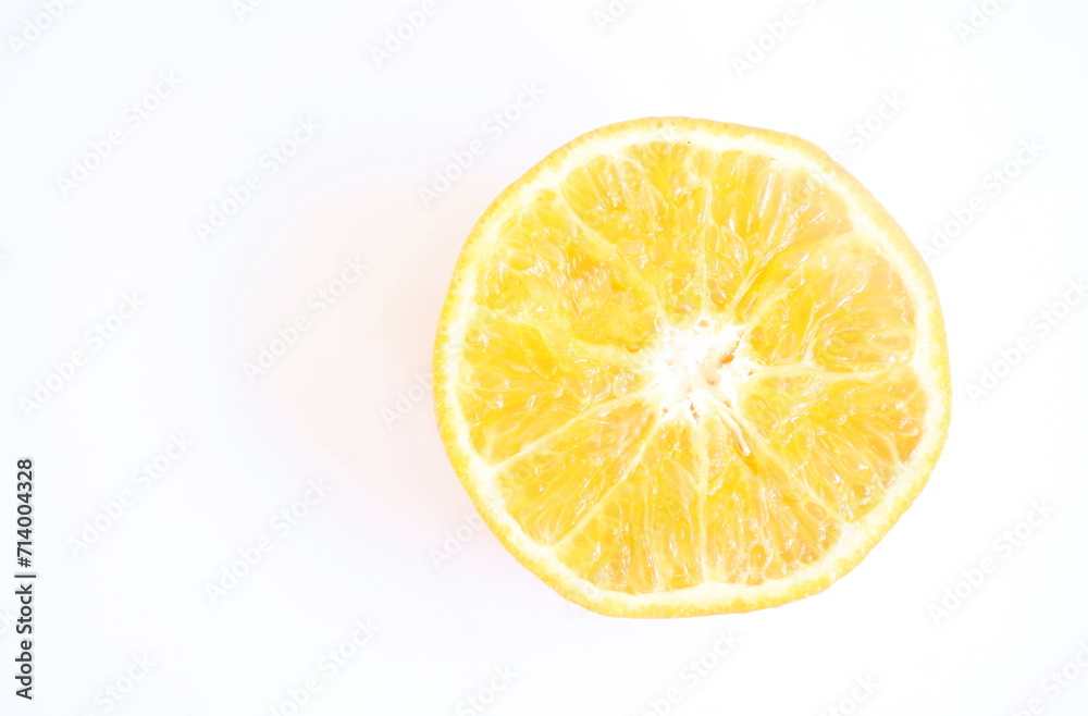 tangerine orange half cut arranging in white background