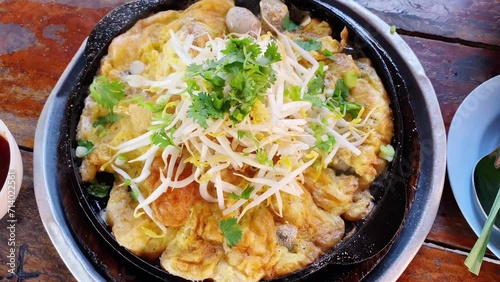 Fried clams, street food in Thailand