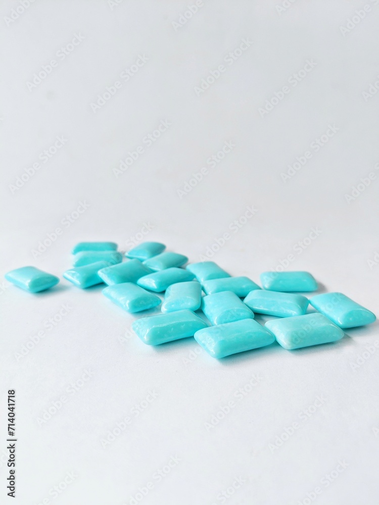 chewing gum granules on a white background chewing gum granules on a white background