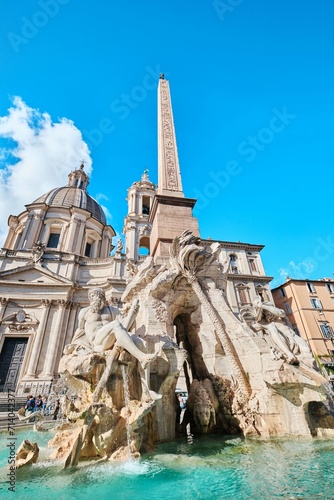 Fountain of Four Rivers (Fontana dei Quattro Fiumi) and Baroque style Sant'Agnese in Agone Church on Navona square, Rome, Italy