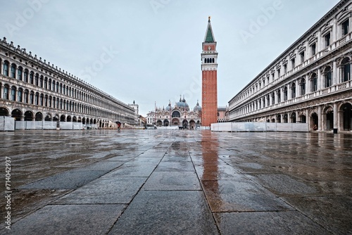 The Piazza San Marco (St Mark's Square) in Venice, with its campanile and church, is the center of Venice