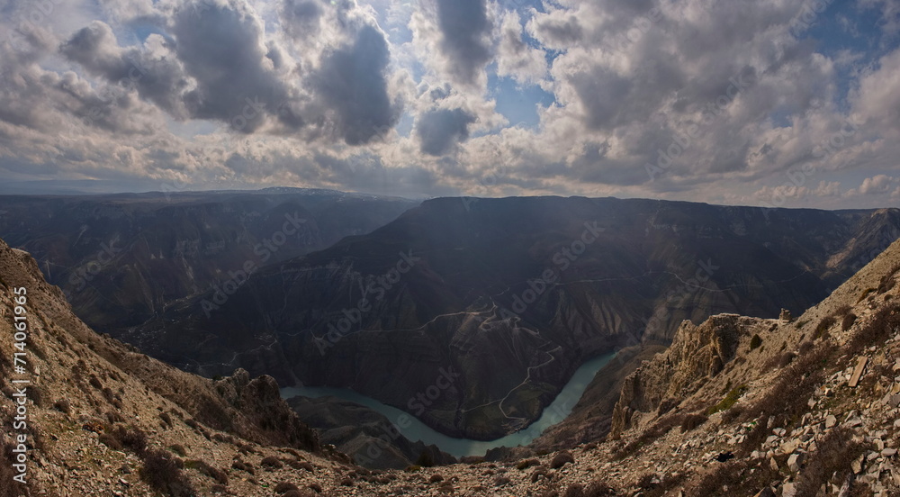 Russia. North-eastern Caucasus. The Republic of Dagestan. A dizzying panoramic view of mountain serpentines on the slopes of the Sulak canyon from the steep cliffs of the village of Dubki.