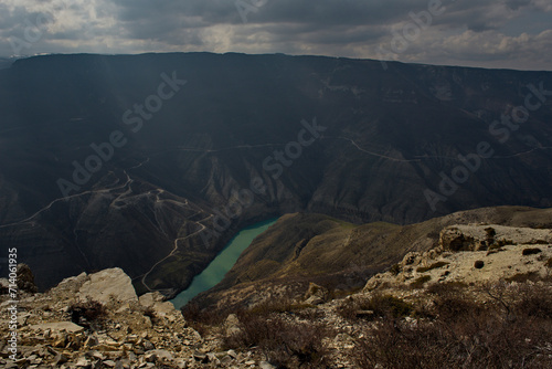 Russia. North-eastern Caucasus. The Republic of Dagestan. A dizzying panoramic view of mountain serpentines on the slopes of the Sulak canyon from the steep cliffs of the village of Dubki. photo