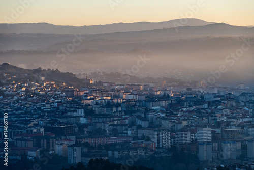 Fototapeta Naklejka Na Ścianę i Meble -  Panorama view of the skyline of the Galician city of Ourense at dusk as seen from the outskirts.