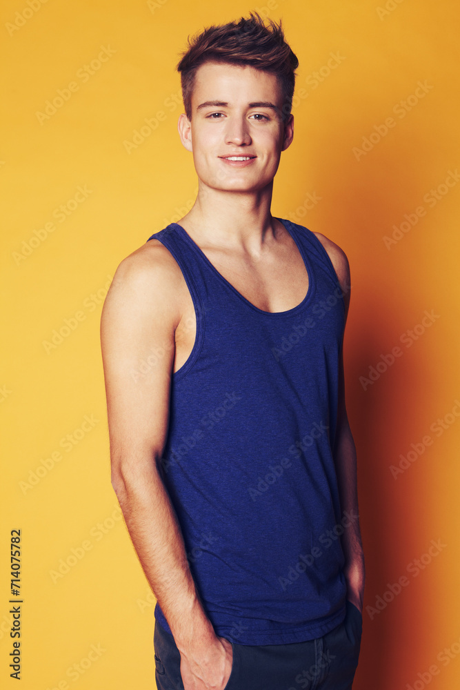 Fashion, smile and portrait of man in studio with trendy, cool or summer clothes on orange background. Face, style and male model with confidence, personality or casual, streetwear or outfit choice Fashion, smile and portrait of man in studio with trendy, cool or summer clothes on orange background. Face, style and male model with confidence, personality or casual, streetwear or outfit choice