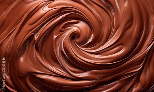 Hazelnut cream swirl texture, melted chocolate background