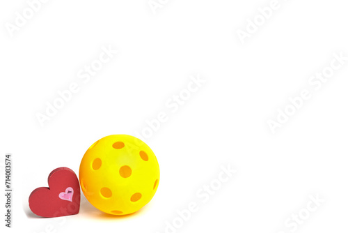 Pickleball Love....yellow Pickleball with red heart on a white background. great for Valentines with lots of room for text.